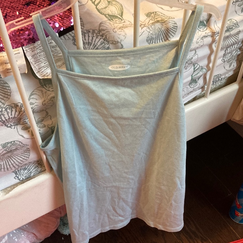 A teal/blue tank top